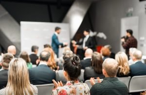 Business professional receiving award submission