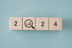 Wooden blocks together spell out 2024