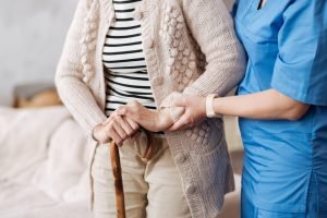 Nurse caring for elderly lady. Local PR.