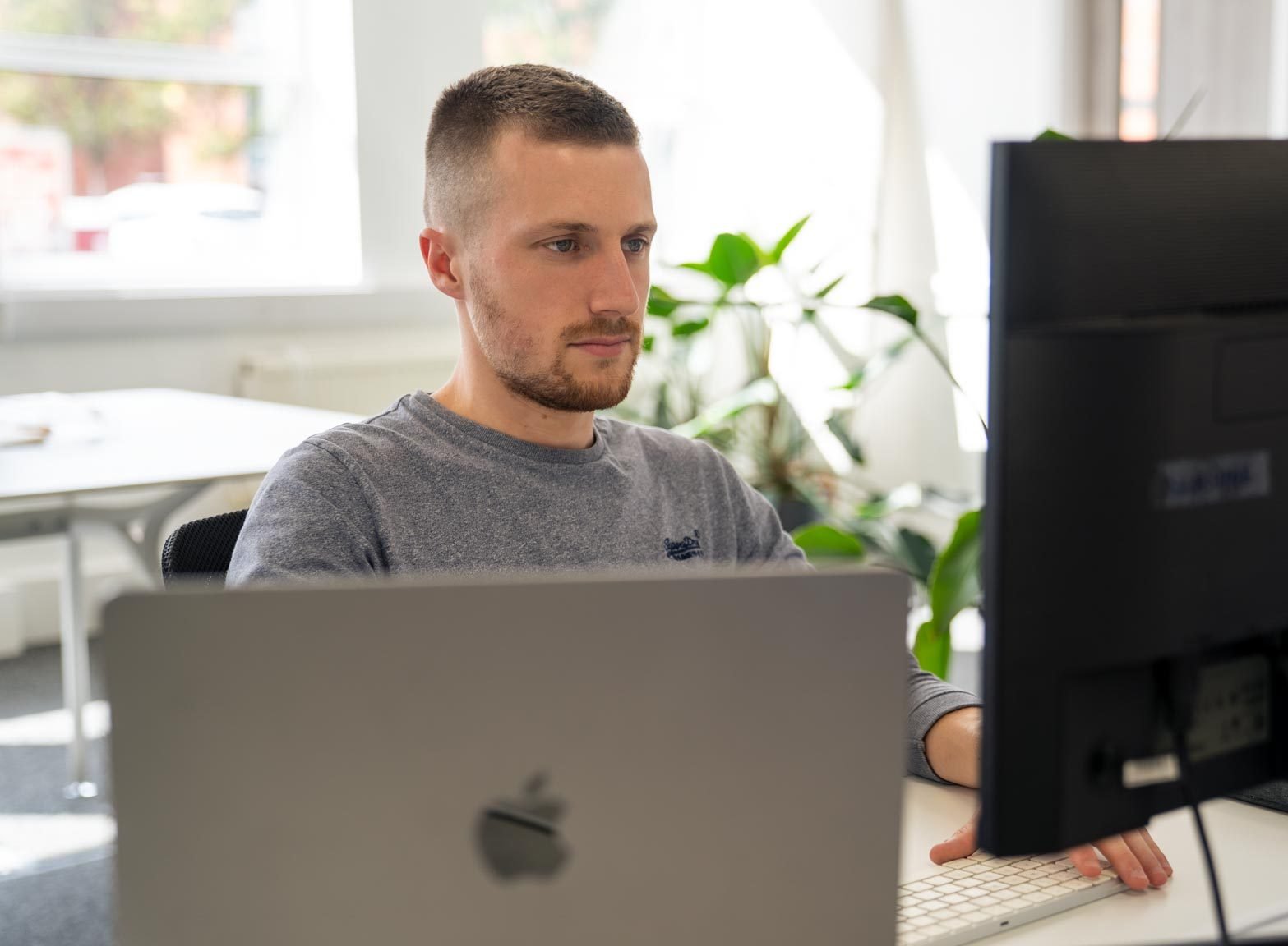 James, our digital marketing executive, working at a screen